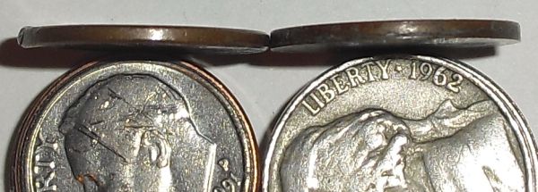 Help-With-Two-Pennies;-Both-Cut,-One-With-No-Reverse..?